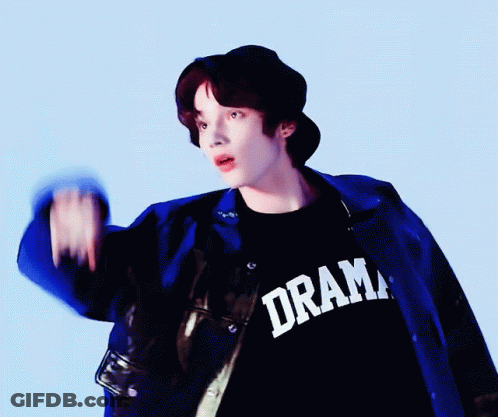 A Young Man Wearing A Ram Shirt And A Devil Hat GIF