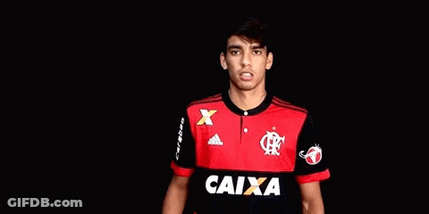 A Young Man Wearing A Red And Black Soccer Jersey With The Word Caixa On It . GIF