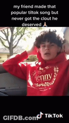 A Young Man Wearing A Red Hoodie That Says Jenny On It GIF