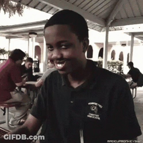 A Young Man Wearing A Shirt That Says ' Champions High School ' On It GIF