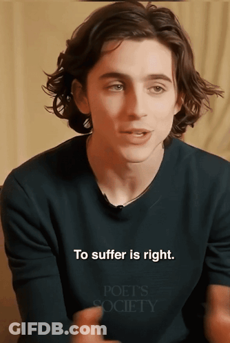 A Young Man Wearing A Shirt That Says Poet 'S Society On It GIF