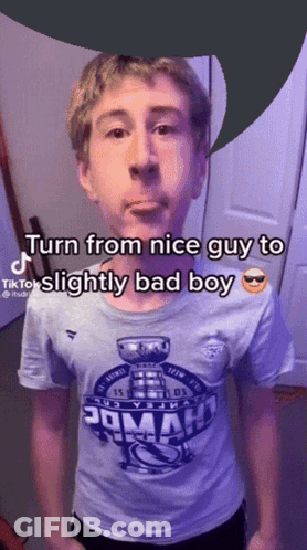 A Young Man Wearing A T-Shirt That Says Poman On It GIF