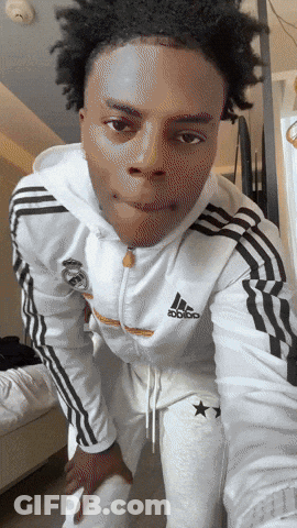 A Young Man Wearing A White Adidas Hoodie GIF