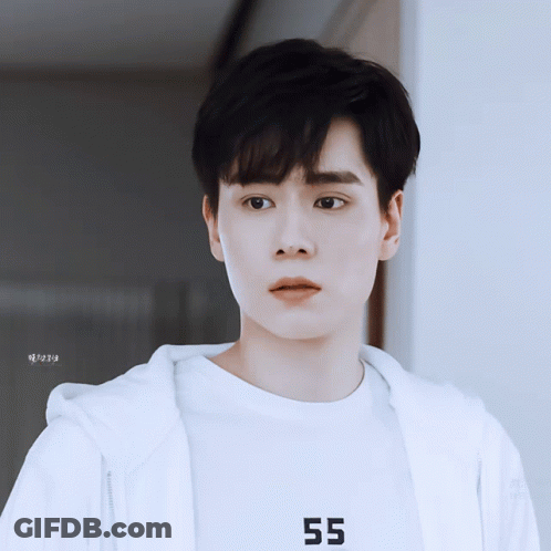 A Young Man Wearing A White Shirt That Says 55 GIF