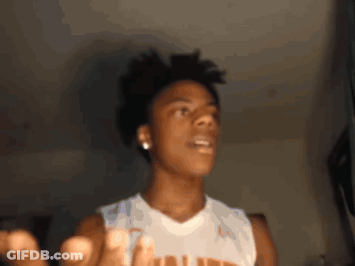A Young Man Wearing A White Tank Top With The Word Louisiana On It GIF