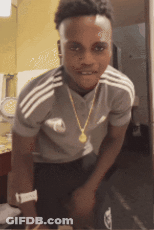 A Young Man Wearing An Adidas Shirt And A Gold Chain GIF