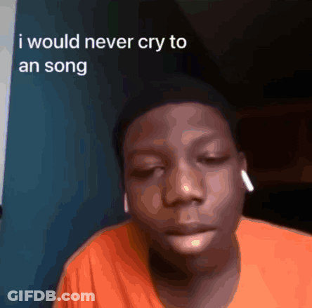 A Young Man Wearing An Orange Shirt Says He Would Never Cry To A Song GIF