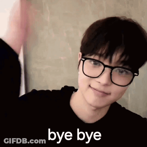 A Young Man Wearing Glasses And A Black Shirt Says Bye Bye . GIF