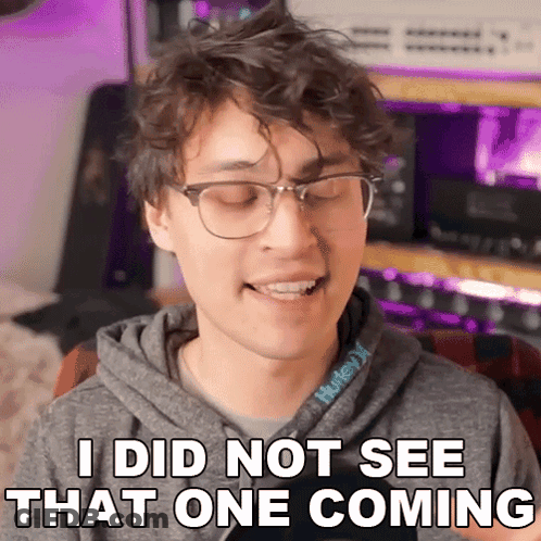 A Young Man Wearing Glasses And A Hurley Sweatshirt Says I Did Not See That One Coming GIF