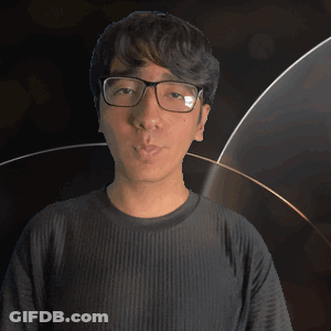 A Young Man Wearing Glasses And A Samson Shirt GIF