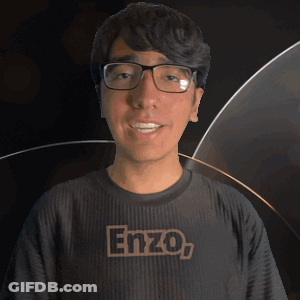 A Young Man Wearing Glasses And A Shirt That Says Enzo On It GIF