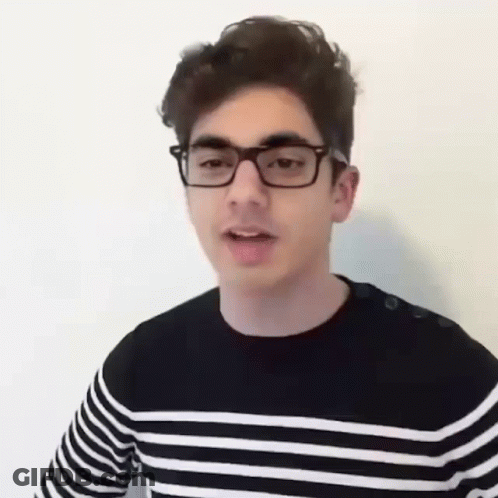 Young Man With Glasses And Striped Shirt GIF