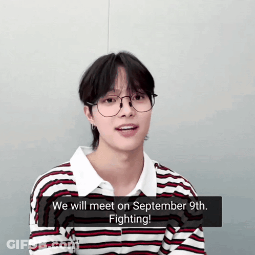 A Young Man Wearing Glasses And A Striped Shirt Says " We Will Meet On September 9Th Fighting " GIF