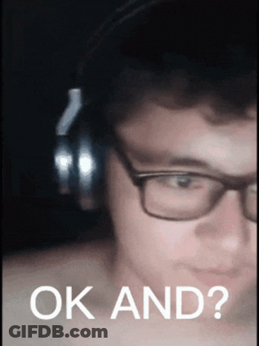 A Young Man Wearing Glasses And Headphones Is Asking The Question " Ok And " GIF