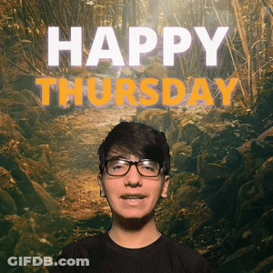 A Young Man Wearing Glasses Is Smiling In Front Of A Happy Thursday Sign GIF