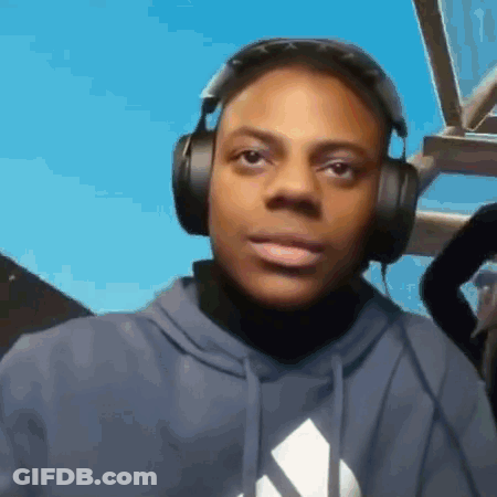 A Young Man Wearing Headphones And A Blue Hoodie . GIF
