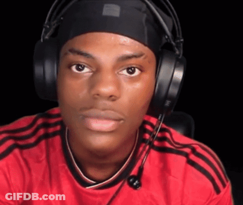 A Young Man Wearing Headphones And A Headband Is Making A Funny Face . GIF