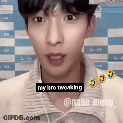 A Young Man Wearing Headphones Is Making A Funny Face While Talking On A Video Call . GIF