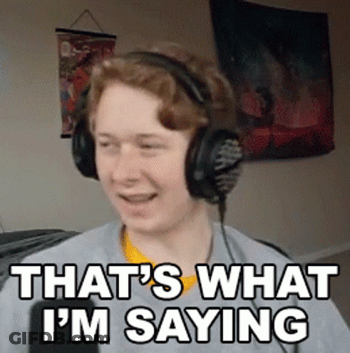 A Young Man Wearing Headphones Is Smiling And Says `` That 'S What I 'M Saying '' . GIF