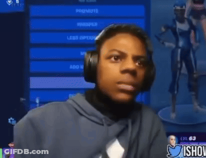 A Young Man Wearing Headphones Is Smiling In Front Of A Screen That Says " Promote " GIF