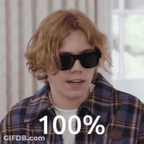 A Young Man Wearing Sunglasses Says 100 % GIF