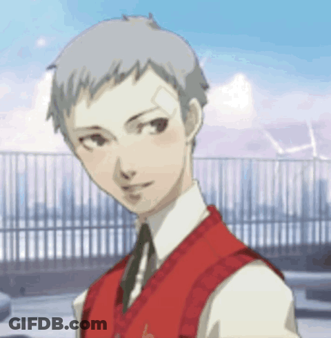 A Young Man With A Bandage On His Face Is Wearing A Red Vest GIF