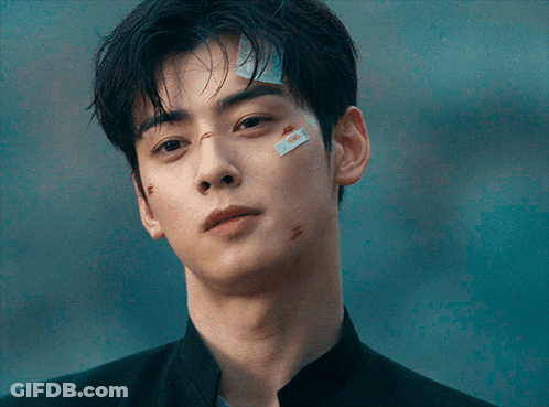 A Young Man With A Bandage On His Forehead GIF