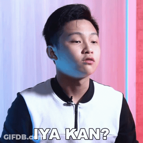 A Young Man With A Microphone In His Ear Says Iya Kan GIF