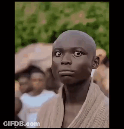 Young Man With Shaved Head Making Funny Face GIF