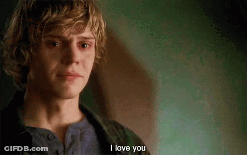 A Young Man With Blonde Hair Is Crying And Says `` I Love You '' . GIF
