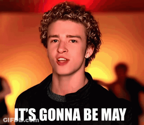 A Young Man With Curly Hair Has The Words " It 'S Gonna Be May " On His Face GIF