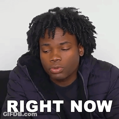 A Young Man With Curly Hair Is Wearing A Black Jacket And Has The Words Right Now Written On His Face . GIF