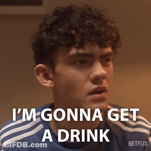 A Young Man With Curly Hair Says I 'M Gonna Get A Drink GIF