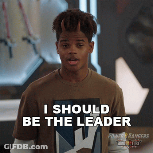 A Young Man With Horns On His Head Is Wearing A Power Rangers Shirt GIF