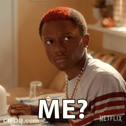 A Young Man With Red Hair Is Sitting At A Table With A Netflix Logo In The Corner GIF