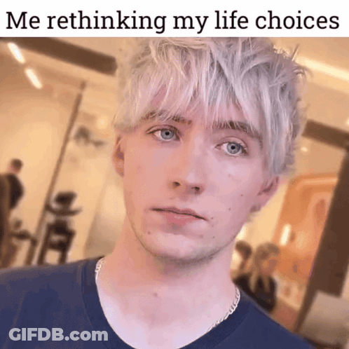 A Young Man With White Hair And Blue Eyes Looks At The Camera With A Caption That Says Me Rethinking My Life Choices GIF