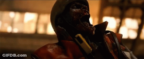 A Zombie Wearing A Helmet And A Gas Mask With His Mouth Wide Open GIF