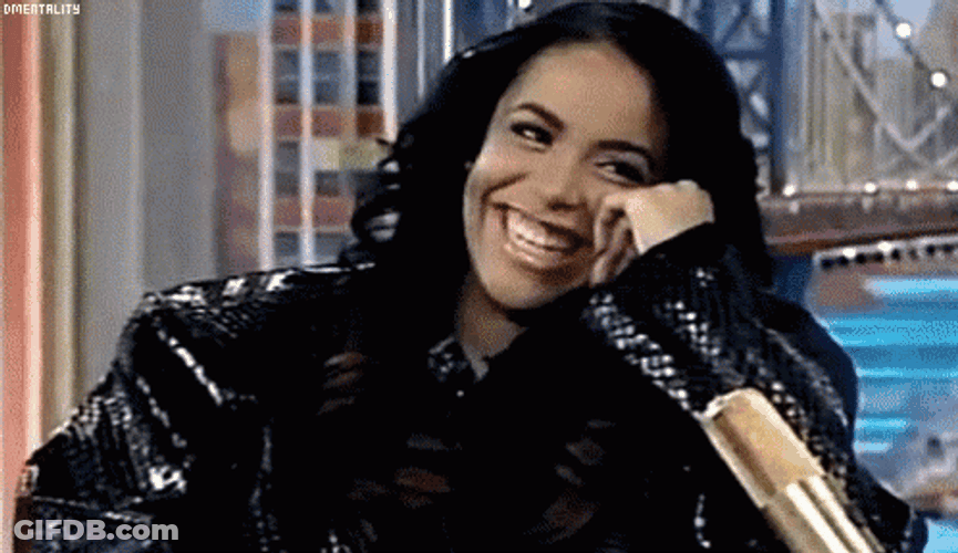 Aaliyah Giggling At Rosie O' Donnell Interview GIF