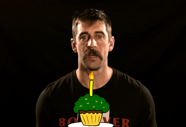 Aaron Rodgers Blowing Birthday Candle GIF