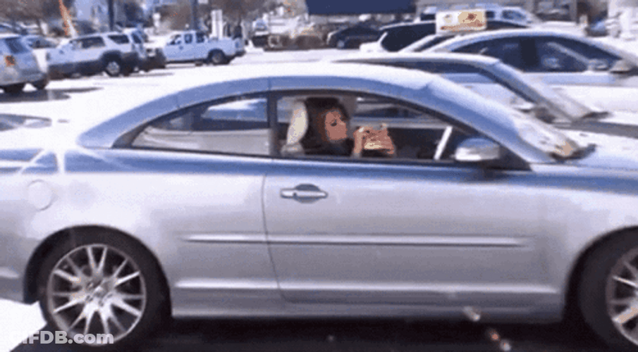 Abby Lee Miller Eats Snack Inside The Car GIF