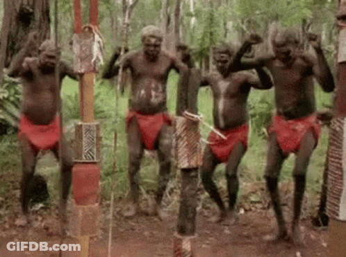 Aboriginal Men Dancing In Woods GIF