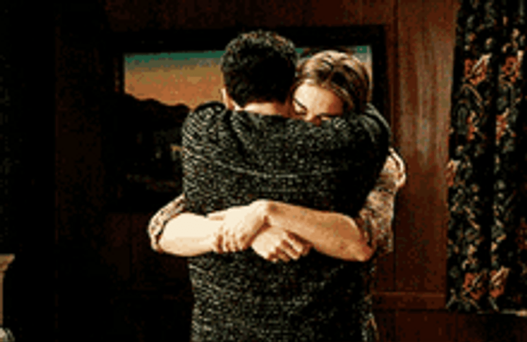 Abrazos Couple Hugging Tightly GIF