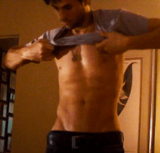 Abs Enrique Iglesias Putting On Shirt GIF