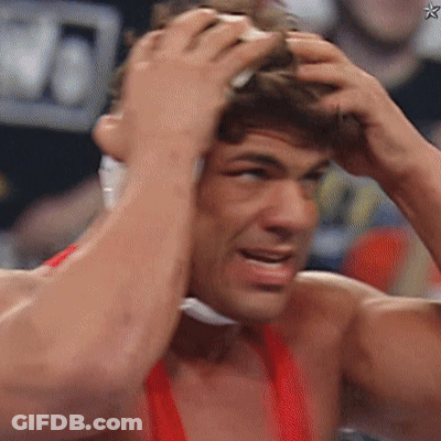 ACC Wrestler Next To Orange Tank Top Wrestler GIF