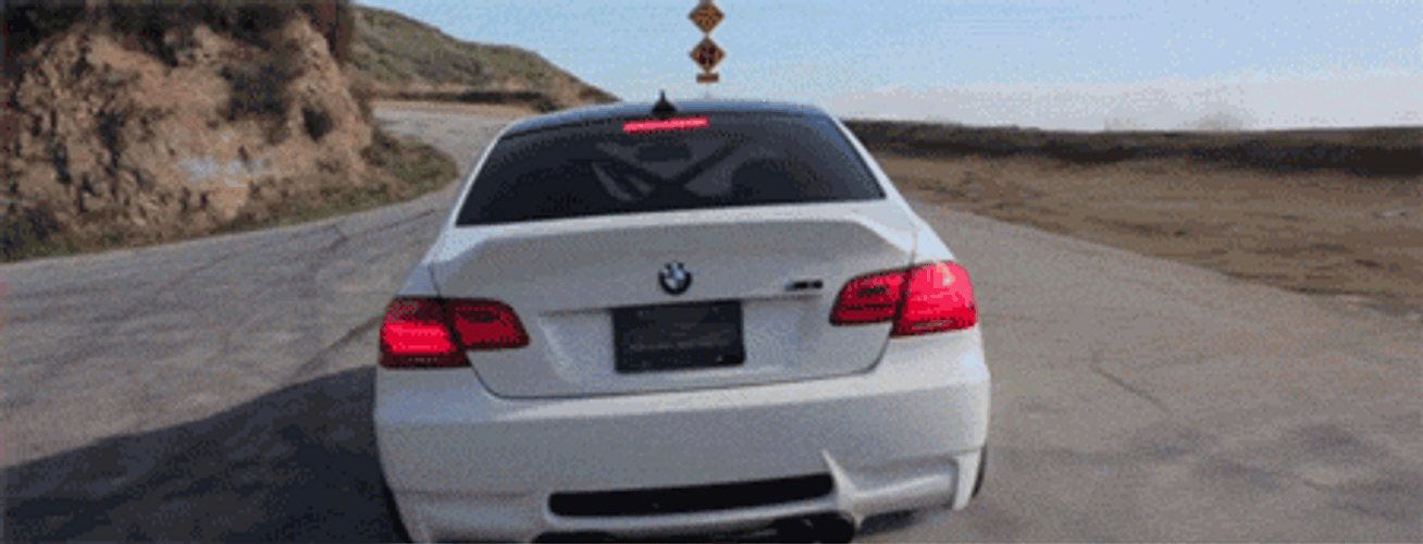 Accelerating White Bmw Car GIF