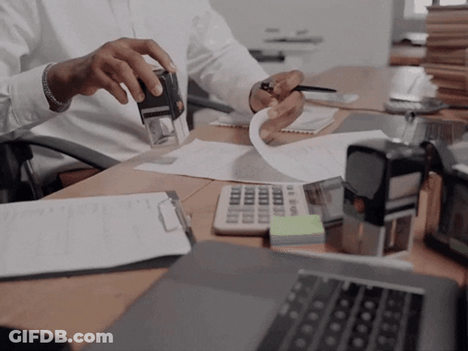 Accountant Stamping Papers GIF