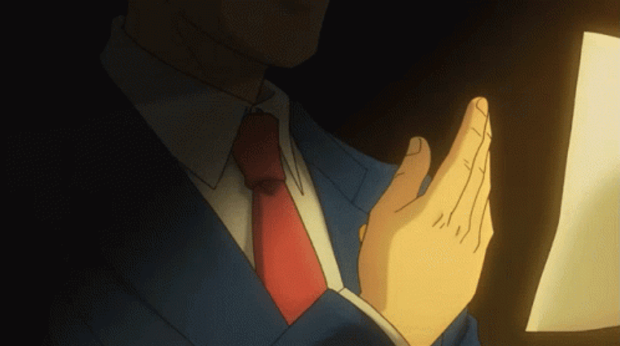 Ace Attorney Smiling Phoenix Wright Reading His Notes GIF