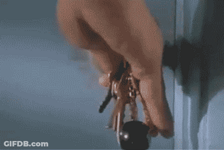 Ace Ventura Unlocking Door Knob GIF