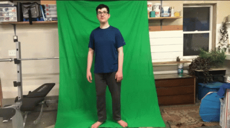 Acting Up In Front Of Green Screen Wall GIF