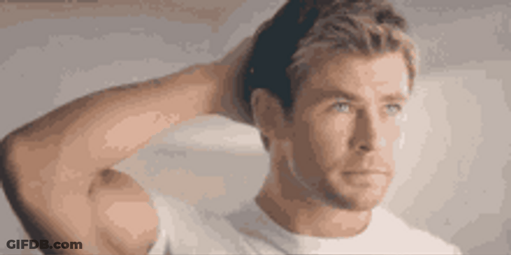 Actor Chris Hemsworth Patting His Head GIF